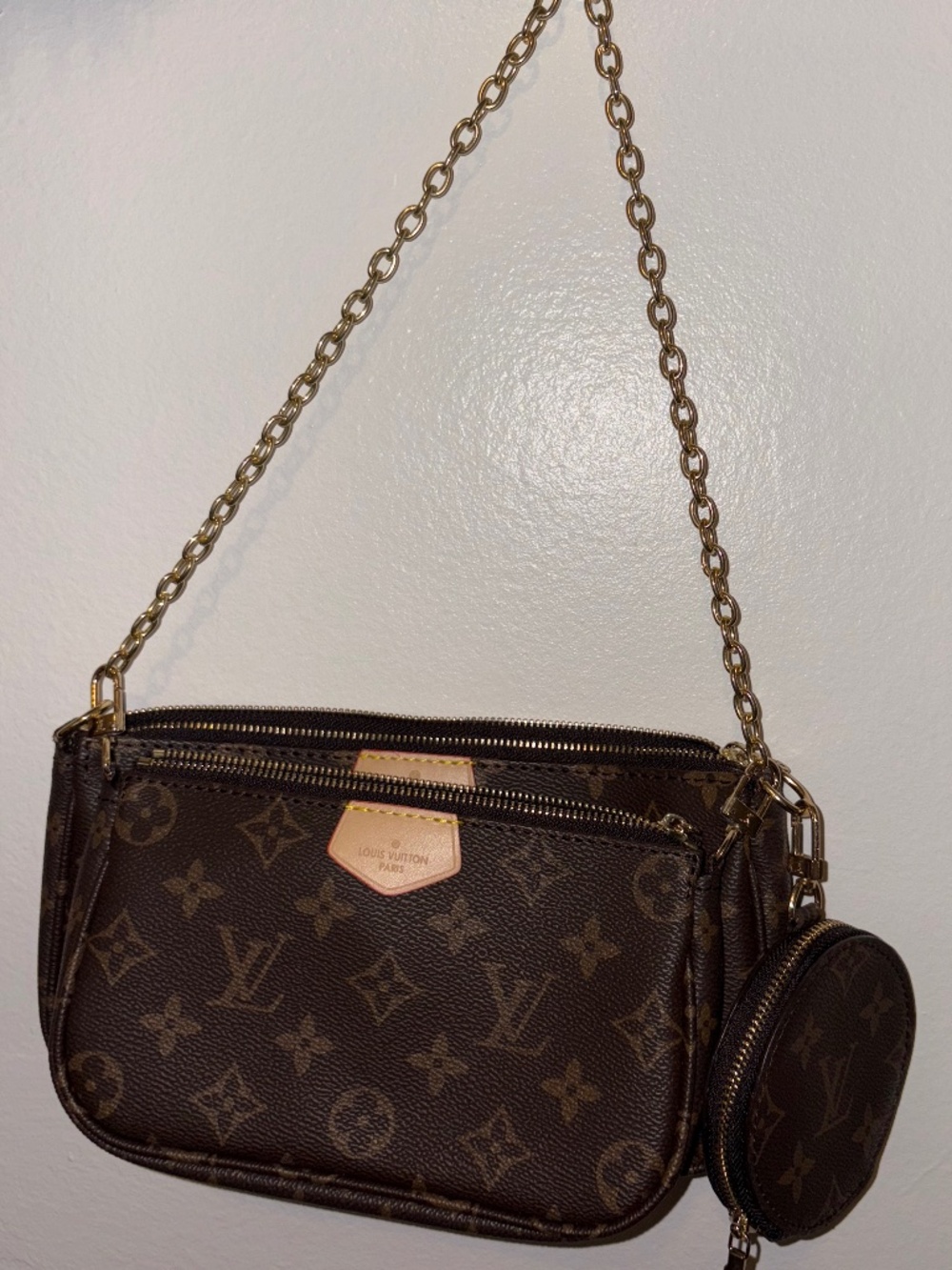 Faux Louis Vuitton shoulder bag from NYC